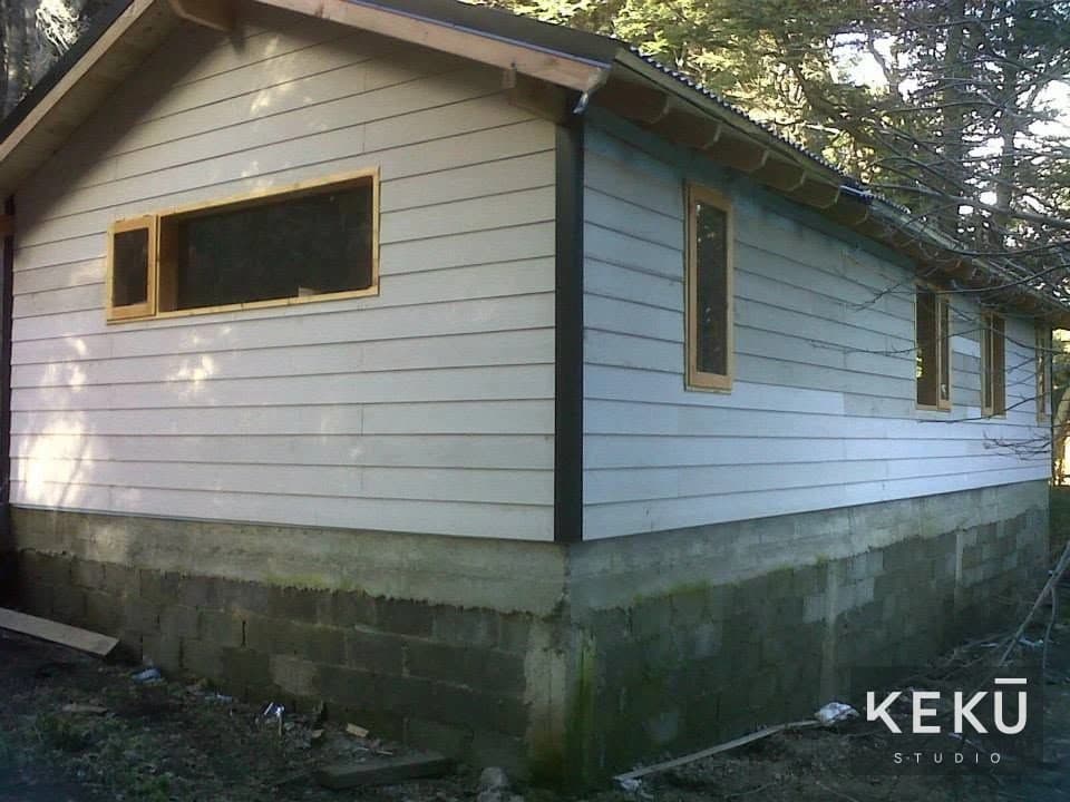 Revestimiento exterior y abertura de la vivienda